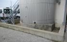 21,000 gallon Mueller mixing tank