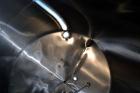 Used Mueller Tank, 5,000 Gallon, 304 Stainless Steel. Approximate 108” Diameter x approximate 125” straight side, dished top and bottom. Partial section of sidewall dimple jacket, no rating. Off cent...