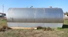 Used Mueller 16,000 Gallon Stainless Steel Horizontal Storage Tank. Approximately 10'6