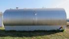 Used Mueller 16,000 Gallon Stainless Steel Horizontal Storage Tank. Approximately 10'6