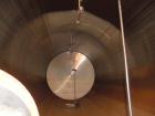 Used Mueller 16,000 Gallon Stainless Steel Horizontal Storage Tank. Approximately 10'6