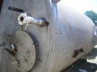 Used-Approximately 8,000 Gallon Vertical 304 Stainless Steel Tank. 9'6