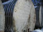 Used-Approximately 8,000 Gallon Vertical 304 Stainless Steel Tank. 9'6