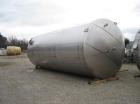 Used Approximately 25,000 gallon vertical stainless steel tank.12' Diameter x 30' straight side.With dished top and sloped bottom.
