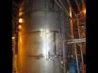 Used-Approximately 13,000 gallon vertical stainless steel tank.12'4