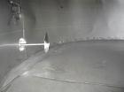 Used Approximately 10,000 gallon stainless steel tank.11'6