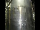 Used-Approximately 9,000 gallon stainless steel tank.11'6