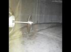 Used-Approximately 12,500 gallon vertical stainless steel tank.12'6