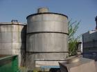 Used- Tank, 10,875 Gallon, 316 Stainless Steel, Vertical. 11'6" diameter x 14'2" straight side, flat top, flat bottom, 18" t...