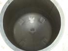 Used Tank, 5000 Gallon, 316 Stainless Steel, Vertical. Approximately 8' diameter x 18' tall, Dome top and dish bottom. Top manway. Center bottom outlet. Top lifting lugs. Mounted on 4 carbon steel le...
