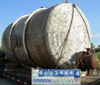 Used Tank, 6000 Gallon, 317 Stainless Steel, Horizontal. Approximately 9' diameter x 12' long, dished ends. Top entering Lightnin agitator, model 118-REC-3.2, ratio 17.40 to 1, output 100/50 rpm. 2