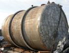 Used Tank, 6000 Gallon, 317 Stainless Steel, Horizontal. Approximately 9' diameter x 12' long, dished ends. Top entering Lightnin agitator, model 118-REC-3.2, ratio 17.40 to 1, output 100/50 rpm. 2