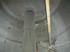 Used Tank, 6000 Gallon, 317 Stainless Steel, Horizontal. Approximately 9' diameter x 12' long, dished ends. Top entering Lightnin agitator, model 118-REC-3.2, ratio 17.40 to 1, output 100/50 rpm. 2