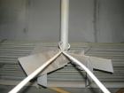 Used Tank, 6000 Gallon, 317 Stainless Steel, Horizontal. Approximately 9' diameter x 12' long, dished ends. Top entering Lightnin agitator, model 118-REC-3.2, ratio 17.40 to 1, output 100/50 rpm. 2