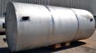Used Tank, 5,700 Gallon, 304 Stainless Steel, Vertical.  Approximately 90’’ diameter x 210’’ straight side.  Coned top, flat bottom.  Openings: top (2) 3’’, 10’’, 4-1/2’’ NPT; side 3’’, 19’’ manway, ...