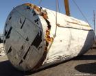 Used Tank, Approximate 22,900 Gallon, 304 Stainless Steel, Vertical. Approximate 148” diameter x 308” straight side, coned top, flat bottom. Openings top 2”, 6”, 9” hand hole with cover. Side bottom ...