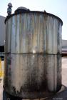Used Tank, 5100 Gallon, 304 Stainless Steel, Vertical. Approximately 114 diameter x 116 straight side, flat top, sloped bottom. Internal ladder. Openings: top (2) 4