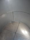 Used Tank, 5100 Gallon, 304 Stainless Steel, Vertical. Approximately 114 diameter x 116 straight side, flat top, sloped bottom. Internal ladder. Openings: top (2) 4