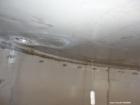 Used Tank, 5100 Gallon, 304 Stainless Steel, Vertical. Approximately 114 diameter x 116 straight side, flat top, sloped bottom. Internal ladder. Openings: top (2) 4