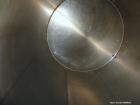 Used Perma-San Tank, 5000 Gallon, 316 Stainless Steel, Vertical. 108” Diameter x 130” straight side, cone top, flat bottom. 20” Diameter top man way with cover. 3” Diameter Tri Clamp Center Top Inlet...