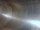 Used Perma-San Tank, 5000 Gallon, 316 Stainless Steel, Vertical. 108” Diameter x 130” straight side, cone top, flat bottom. 20” Diameter top man way with cover. 3” Diameter Tri Clamp Center Top Inlet...