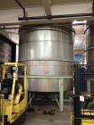 Used Perry 10,500 Gallon 316 Stainless Steel Storage Tank. Approx. 11' Diameter x 14' Straight Side. Cone Bottom. Mounted on 6 I-Beam legs. Approx. 3