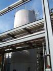 Used Industrial Air Inc. Approx. 31,300 Gallon Vertical 304L Stainless Steel Storage Tank, built 1986. Slight cone top, flat...