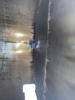 Used-Stainless steel tank, Approximately 7,500 Gallon