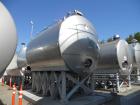 Used Santa Rosa 10,000 Gallon Stainless Steel Horizontal Storage Tank. Approximately 10'6