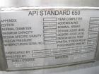 Used Santa Rosa Stainless Steel Storage Tank. API Standard 650. 10,985 Gallon Capacity. Type 304SS Material Construction. Vertical Design. Approximate 10’ Diameter x 18’ Straight Side.  Internal Atmo...