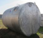 Used Saracco Tank & Mfg Approximately 5,200 Gallon Stainless Steel Storage Tank. Approximately 9' diameter x 11' straight side. Flat bottom and slight cone top. Various top openings including a 17
