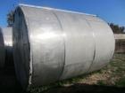 Used Saracco Tank & Mfg Approximately 5,200 Gallon Stainless Steel Storage Tank. Approximately 9' diameter x 11' straight side. Flat bottom and slight cone top. Various top openings including a 17