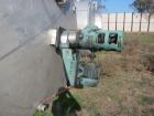 Used Saracco Tank & Mfg Approximately 5,200 Gallon Stainless Steel Storage Tank. Approximately 9' diameter x 11' straight side. Flat bottom and slight cone top. Various top openings including a 17