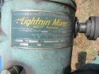 Used Saracco Tank & Mfg Approximately 5,200 Gallon Stainless Steel Storage Tank. Approximately 9' diameter x 11' straight side. Flat bottom and slight cone top. Various top openings including a 17