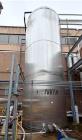 Used Single Wall 17,000 Gallon Stainless Steel Tank, Vertical. Single wall. Side bottom outlet. Last used as waste water tank.