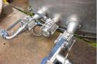 Used Single Wall 17,000 Gallon Stainless Steel Tank, Vertical. Single wall. Side bottom outlet. Last used as waste water tank.