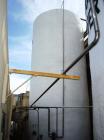 Used Valley Foundry 13,000 Gallon Vertical Stainless Insulated Tank. Vertical flat bottom tank with spray-on insulation and sightglass. Bottom front 3