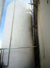 Used Valley Foundry 13,000 Gallon Vertical Stainless Insulated Tank. Vertical flat bottom tank with spray-on insulation and sightglass. Bottom front 3
