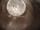 Used Valley Foundry 13,000 Gallon Vertical Stainless Insulated Tank. Vertical flat bottom tank with spray-on insulation and sightglass. Bottom front 3