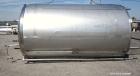 Used Walker Stainless Tank, 5000 Gallon, Model 9559, 304 Stainless Steel, Vertical. Approximately 96” diameter x 164” straight side, dished top, sloped bottom. Openings: top (2) 1-1/4” NPT, 2