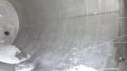 Used Walker Stainless Tank, 5000 Gallon, Model 9559, 304 Stainless Steel, Vertical. Approximately 96” diameter x 164” straight side, dished top, sloped bottom. Openings: top (2) 1-1/4” NPT, 2