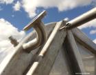 Used Walker Stainless Tank, 5000 Gallon, Model 9560, 304 Stainless Steel, Vertical. Approximate 120” diameter x 104” straight side, dished top, sloped bottom. Openings top (2) 3” NPT, 18” man way wit...