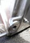 Used Walker Stainless Tank, 5000 Gallon, Model 9561, 304 Stainless Steel, Vertical. Approximate 120” diameter x 104” straight side, dished top, sloped bottom. Openings top (2) 3” NPT, 18” man way wit...