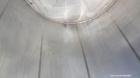 Used Walker Stainless Tank, 5000 Gallon, Model 9561, 304 Stainless Steel, Vertical. Approximate 120” diameter x 104” straight side, dished top, sloped bottom. Openings top (2) 3” NPT, 18” man way wit...