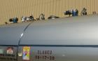 Used Walker Stainless Tank, Model HHT, Approximate 13,500 Gallon, 316L Stainless Steel, Horizontal. 120” Diameter x 264” straight side, dished heads. (2) Top entering agitators with approximate 1-1/2...