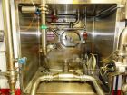 Used Walker Stainless 47,500 Gallon Stainless Steel Silo, Model VSHT/304SS.  Built in 2000.  Single wall stainless steel alcove style storage silo previously used to store spring water.  Alcove area ...