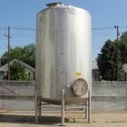 Used- Walker 5000 Gallon 304 Stainless Steel Vertical Tank. This tank has a dome top and a dish bottom. The tank diameter is...