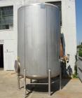 Used- Walker 5000 Gallon 304 stainless Steel Vertical Tank. This tank has a dome top and a dish bottom. The tank diameter is...