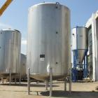 Used- Walker 5000 Gallon 304 stainless Steel Vertical Tank. This tank has a dome top and a dish bottom. The tank diameter is...