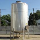 Used- Walker 5000 Gallon Vertical 304 Stainless Steel Tank. This tank has a dome top and a dish bottom. The tank diameter is...